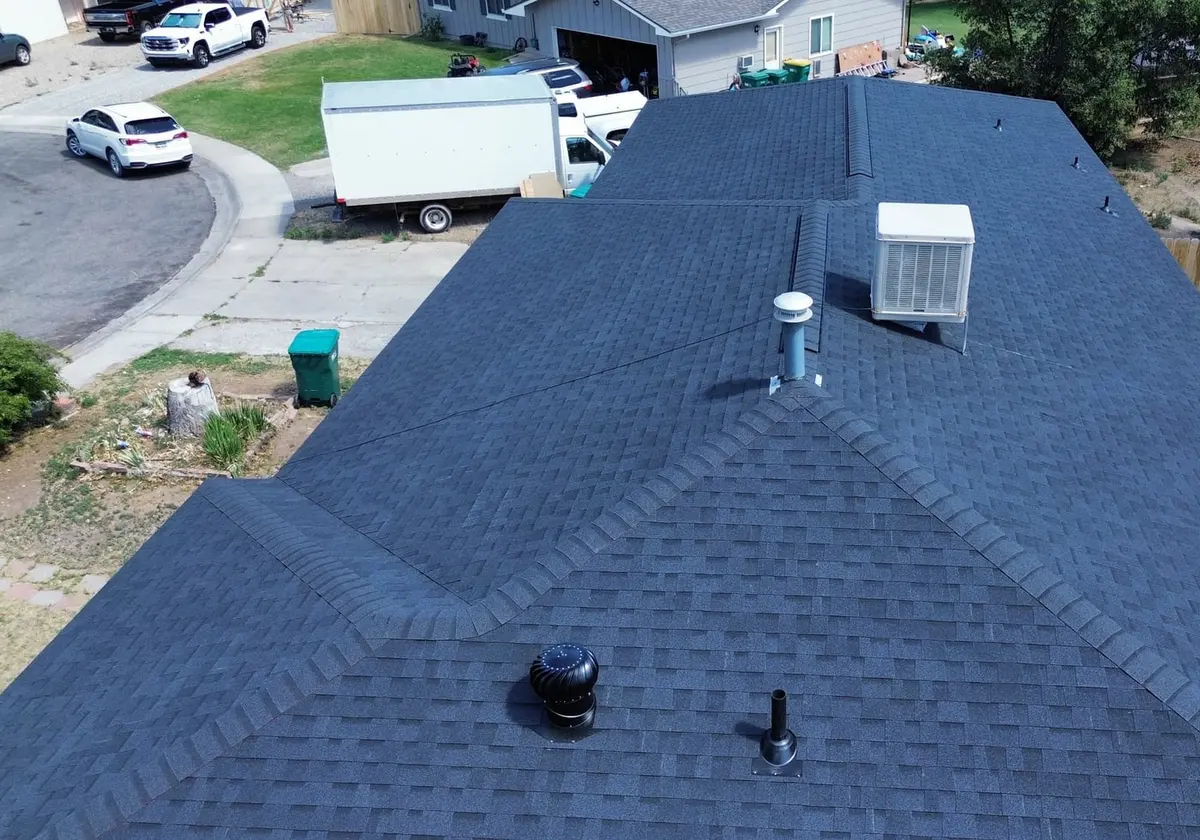 Finished Onyx Black shingle roof with ridge vents, Fruita